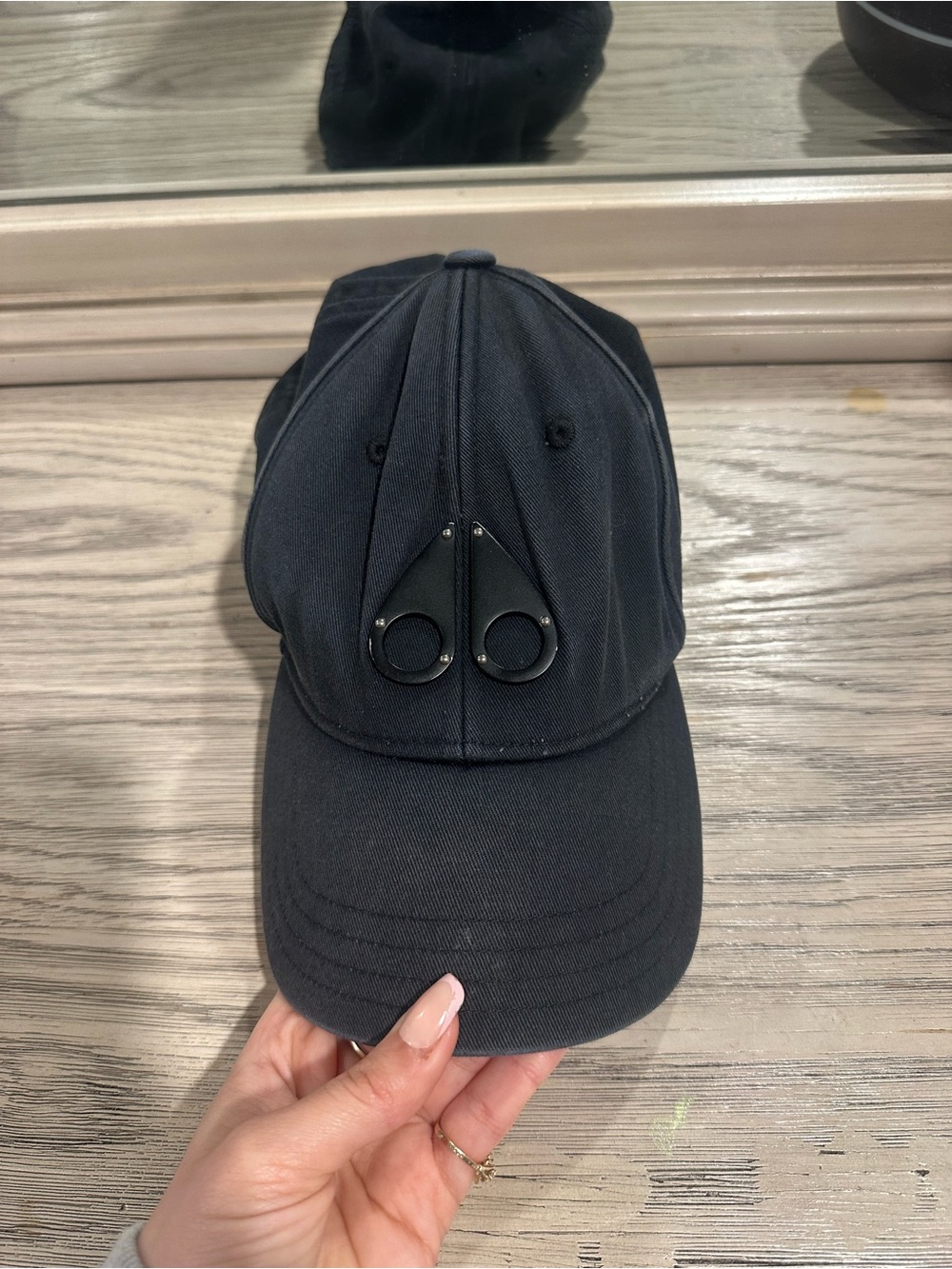 Moose Knuckles Black Baseball Cap with Metal Teardrop Logo